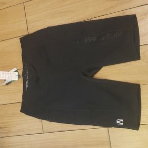 Womans workout shorts length from waist to end of the shirts is 19 in